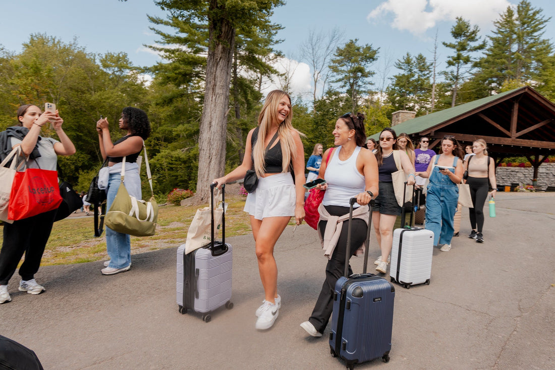 Group of women arriving at camp by Camp Social