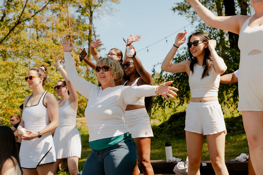 Women enjoying a group activity at a wellness retreat