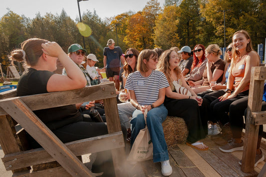 Women relaxing together at an adult summer camp