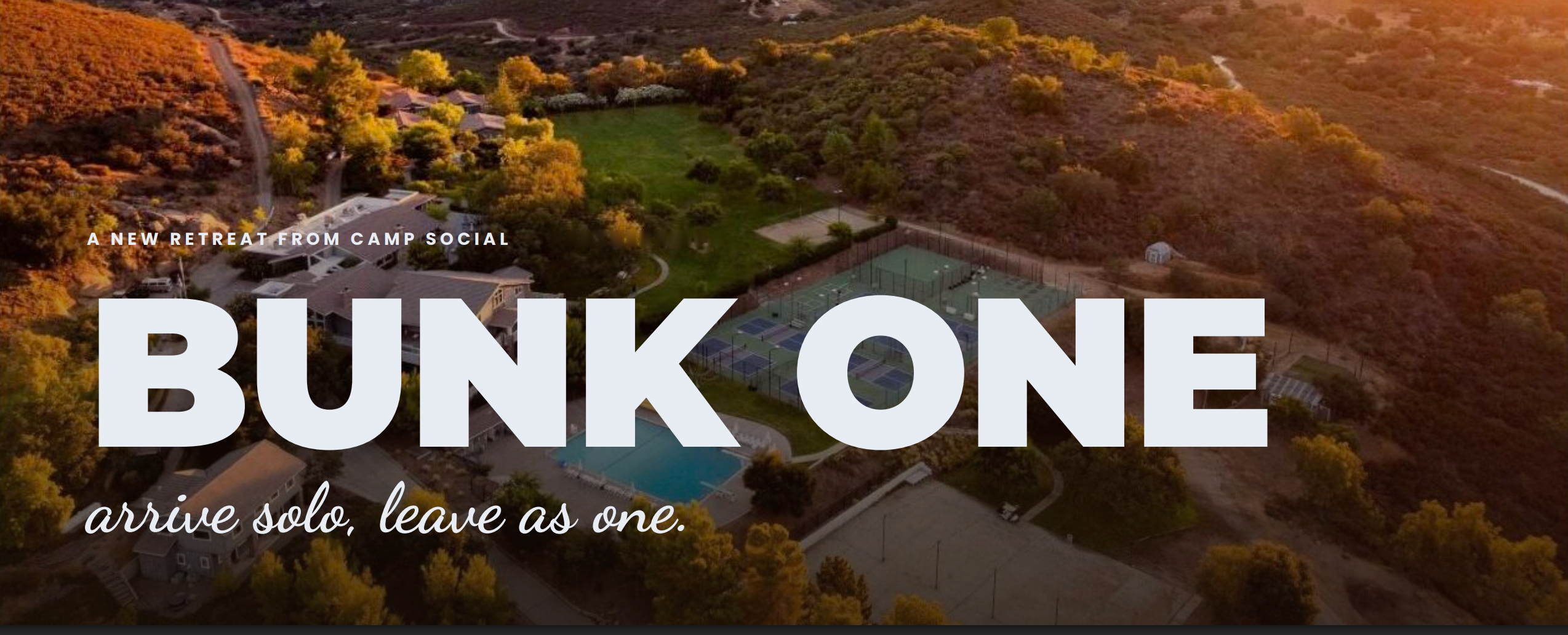 Bunk One graphic over aerial view of a camp with fields and a pool